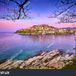 stock-photo-incredibly-romantic-sunny-spring-seascape-on-aegean-sea-colorful-morning-view-of-kavala-city-1049813261